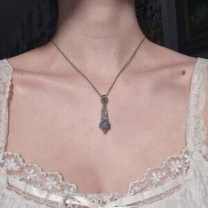 Vintage elegant blue pearl basket necklace with a small silver chain